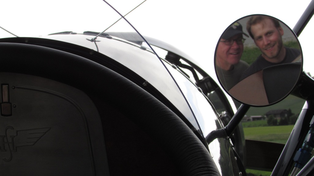 Two lucky guys in strut mounted mirror view