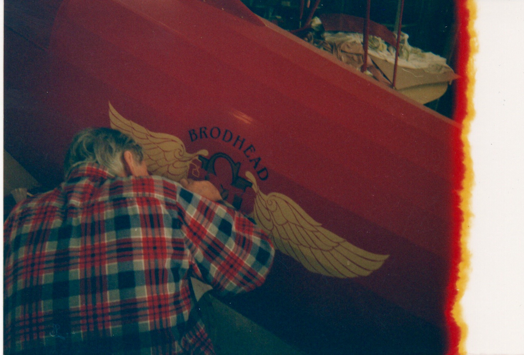 Mehlin painting the Broadhead Hatz logo